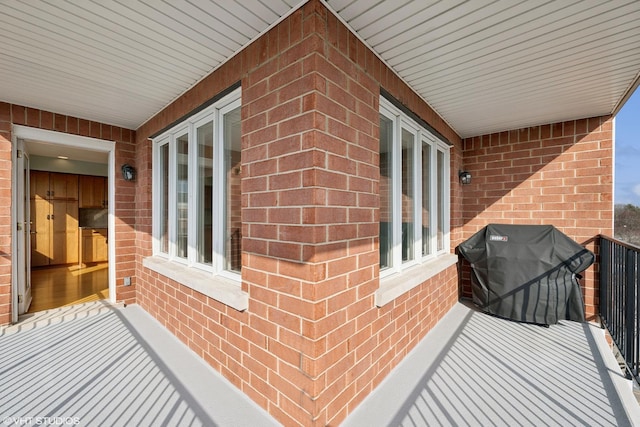 balcony featuring area for grilling