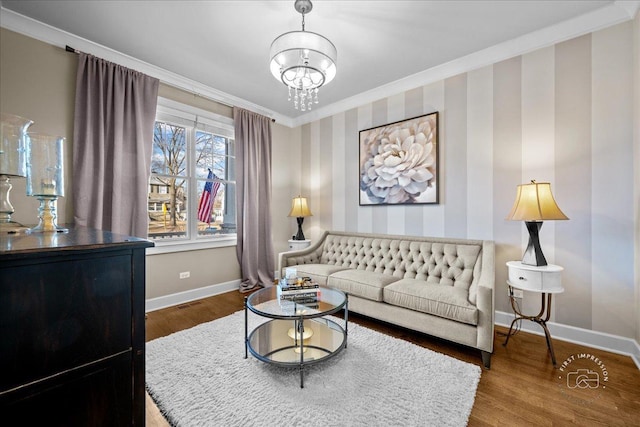 living area featuring wood finished floors, baseboards, and ornamental molding