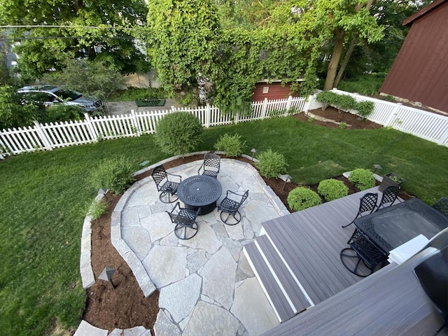 view of yard with a patio and a fenced backyard