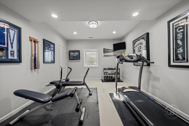 workout room with recessed lighting and baseboards