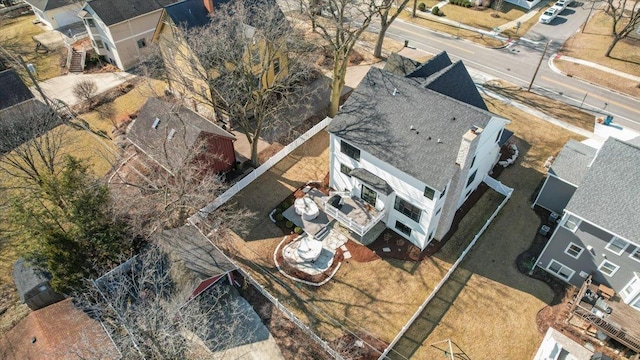 birds eye view of property with a residential view