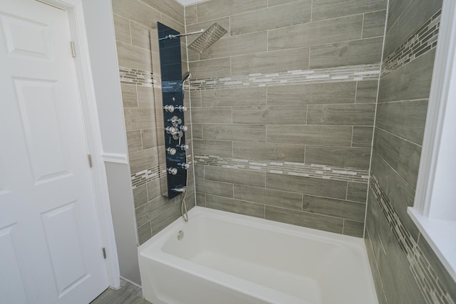 bathroom with shower / washtub combination