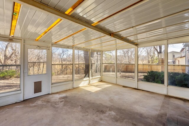 unfurnished sunroom with a healthy amount of sunlight