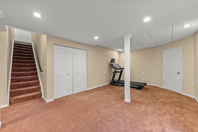 exercise room featuring recessed lighting, light carpet, and baseboards