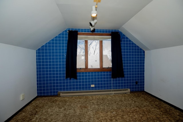 bonus room featuring carpet floors, baseboards, vaulted ceiling, and baseboard heating