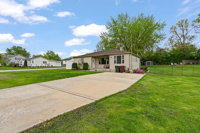 view of front of property featuring covered porch, driveway, and a chimney