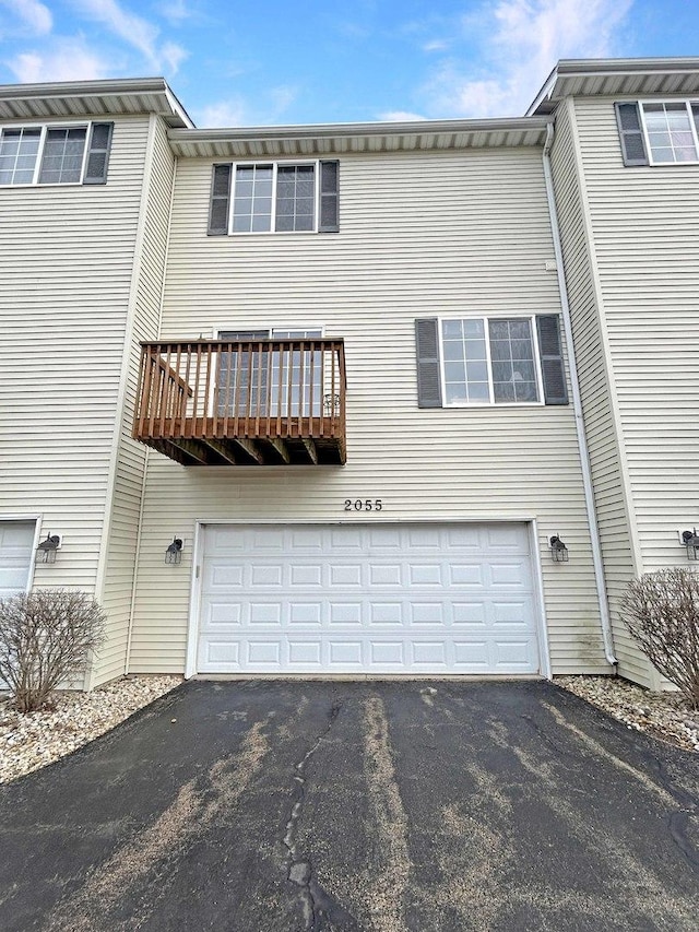 view of front of home featuring driveway and an attached garage