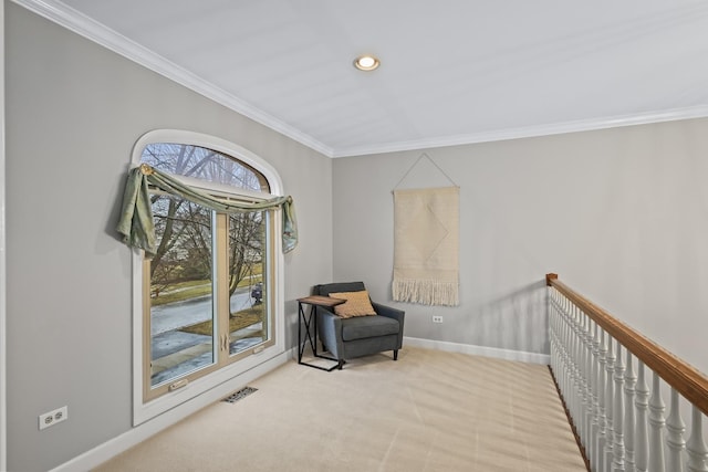 living area with recessed lighting, carpet floors, visible vents, baseboards, and ornamental molding