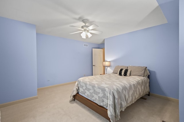 bedroom featuring carpet, visible vents, ceiling fan, and baseboards