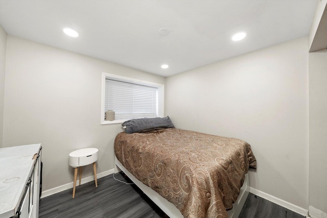 bedroom with baseboards, dark wood-style flooring, and recessed lighting