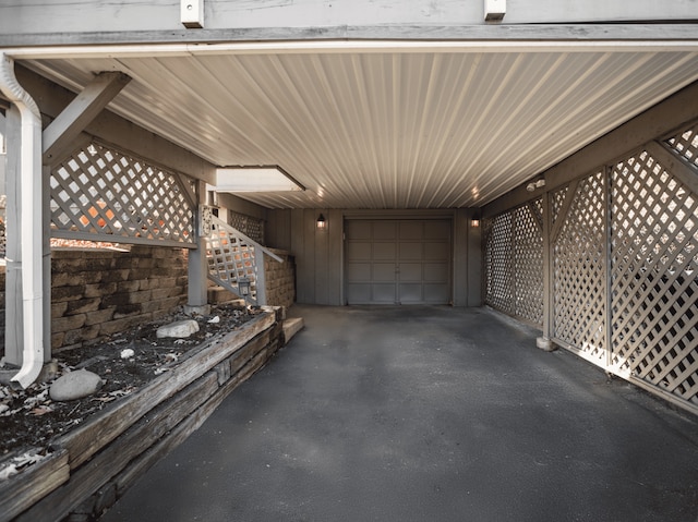 view of patio featuring a garage