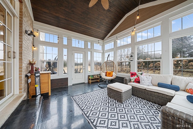 sunroom / solarium featuring lofted ceiling, wood ceiling, and ceiling fan