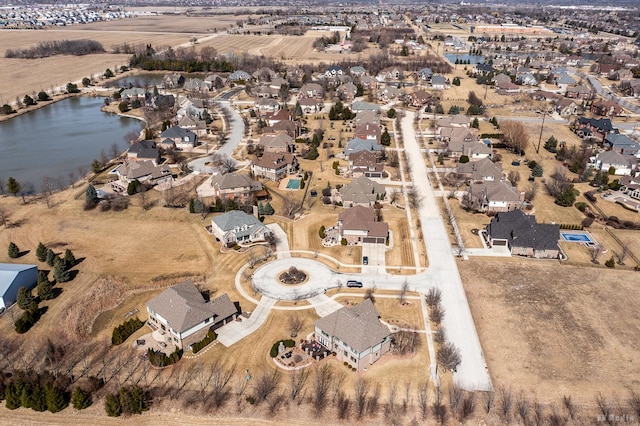 aerial view featuring a residential view and a water view