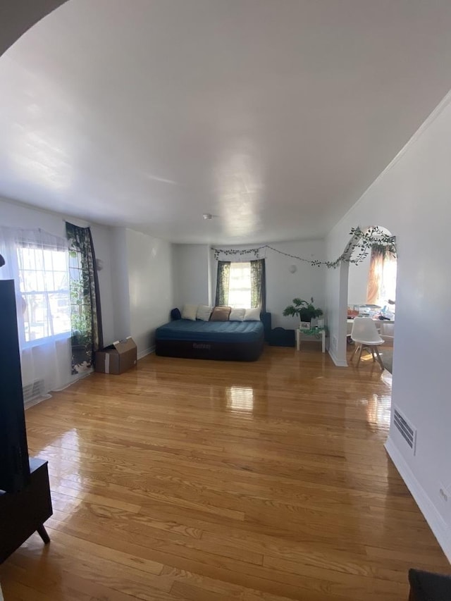 3300 N Osage Ave, Chicago, IL 60634 - unfurnished bedroom featuring baseboards, light wood-type flooring, and visible vents
