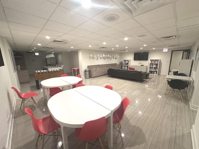 dining area with recessed lighting, visible vents, and a paneled ceiling