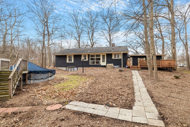 11040 W Cleveland Rd, Mokena, IL 60448 - view of front facade with a deck and a chimney