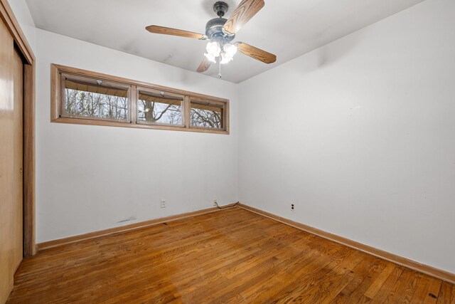 11040 W Cleveland Rd, Mokena, IL 60448 - spare room featuring baseboards, wood finished floors, and ceiling fan