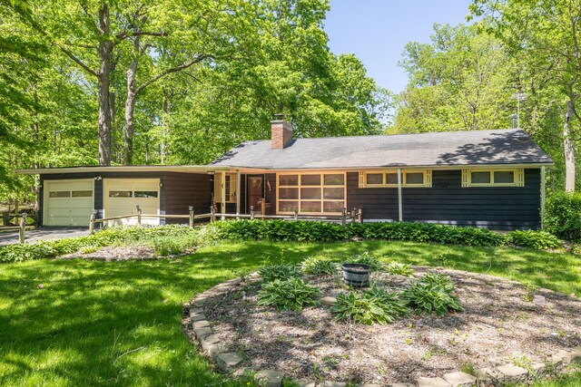 11040 W Cleveland Rd, Mokena, IL 60448 - single story home featuring an attached garage, a chimney, a sunroom, a front yard, and driveway