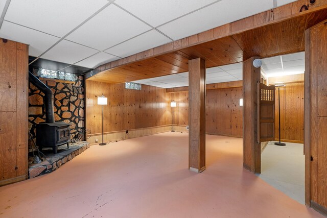 11040 W Cleveland Rd, Mokena, IL 60448 - finished basement featuring wooden walls and a wood stove