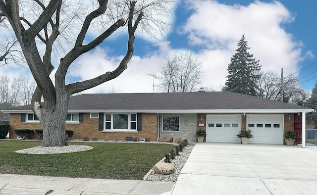 single story home with a garage, brick siding, driveway, roof with shingles, and a front yard