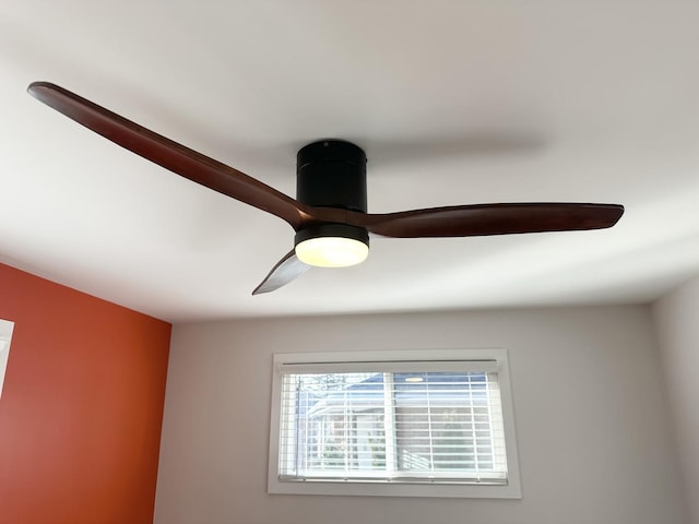 interior details featuring ceiling fan