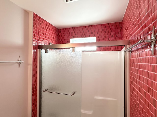 full bath featuring a stall shower