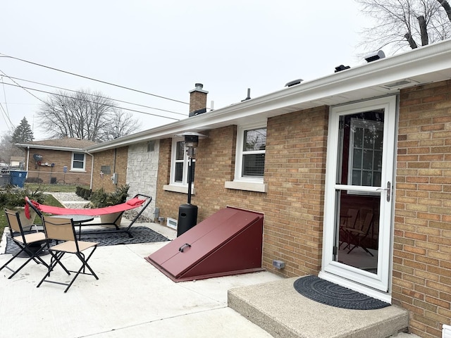 exterior space with outdoor dining area