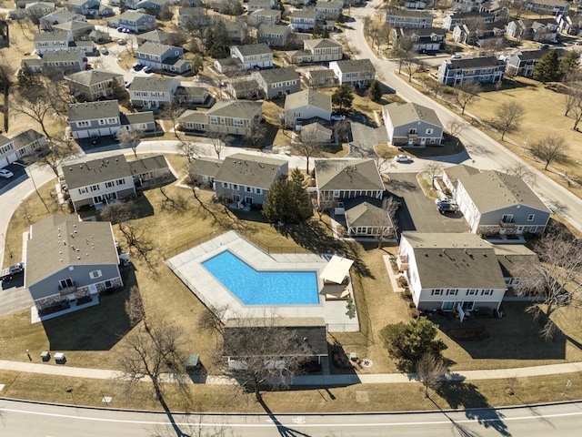 birds eye view of property with a residential view