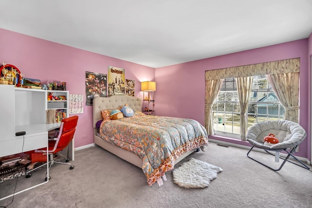 carpeted bedroom with visible vents