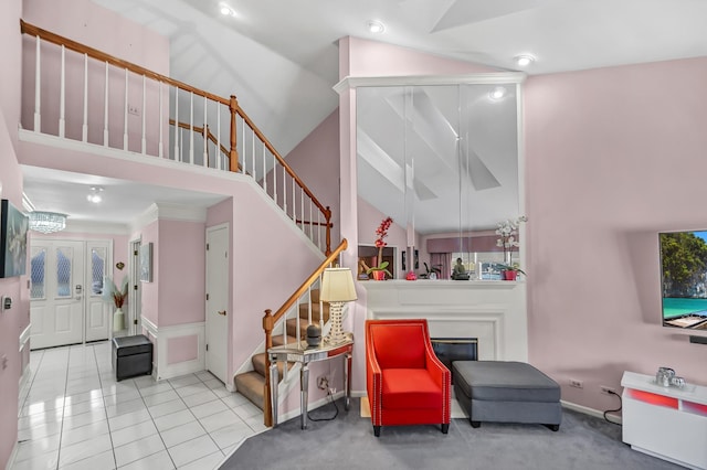 interior space featuring recessed lighting, tile patterned flooring, and high vaulted ceiling
