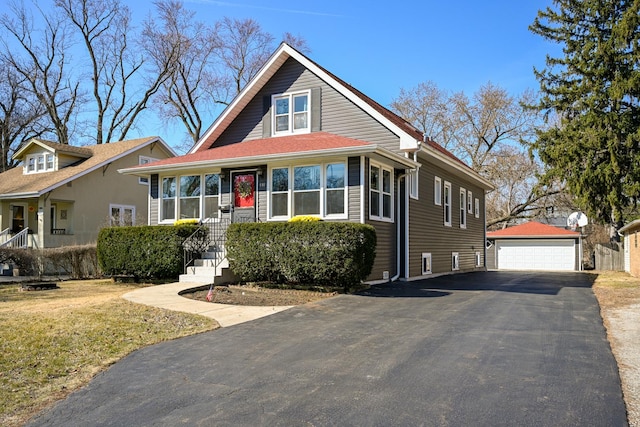 view of front of home with an outbuilding and a garage