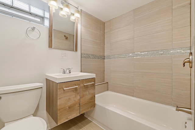 bathroom with  shower combination, vanity, and toilet