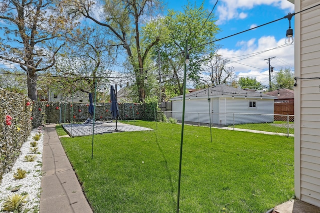 view of yard with a patio area and a fenced backyard