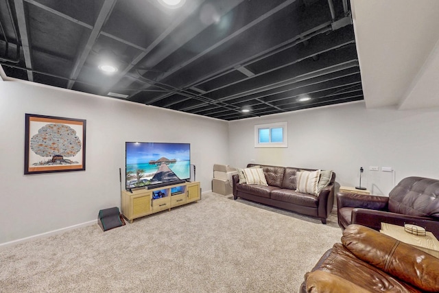 living room featuring baseboards and carpet