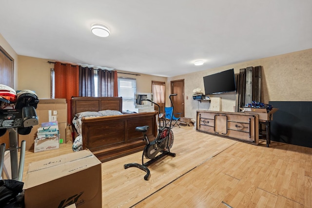 bedroom featuring wood finished floors