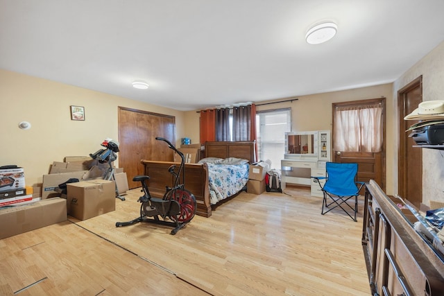 bedroom featuring light wood finished floors