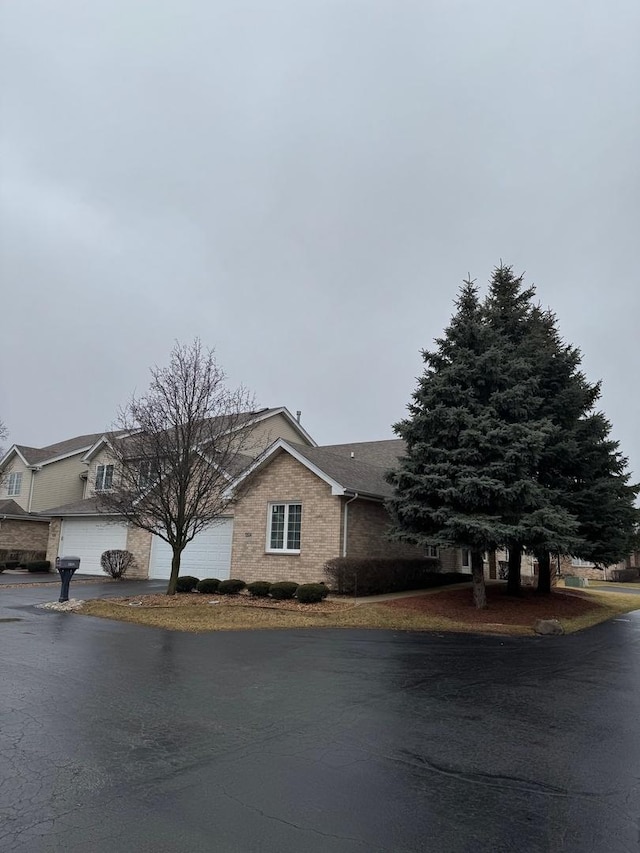 view of home's exterior featuring brick siding