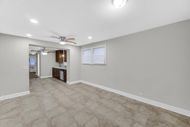 unfurnished living room featuring recessed lighting, ceiling fan, and baseboards