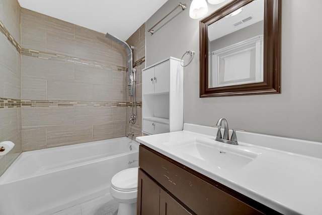 bathroom with toilet, bathtub / shower combination, visible vents, and vanity