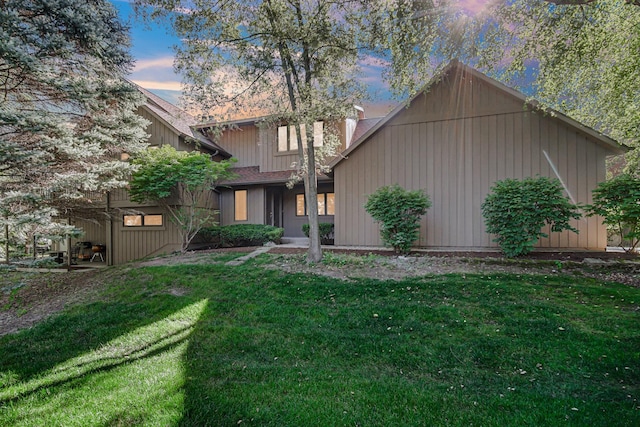 view of front of house with a lawn