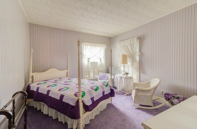 bedroom featuring carpet flooring and wallpapered walls