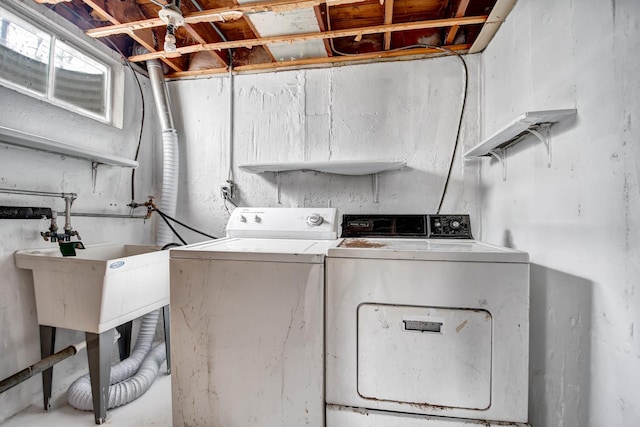 clothes washing area with laundry area and separate washer and dryer