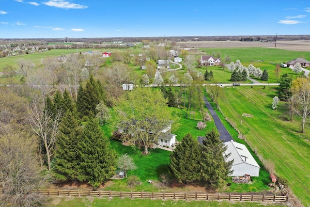birds eye view of property featuring a rural view