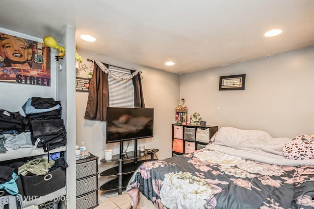 bedroom with tile patterned flooring and recessed lighting