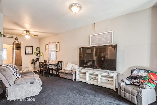 living room featuring carpet floors and ceiling fan