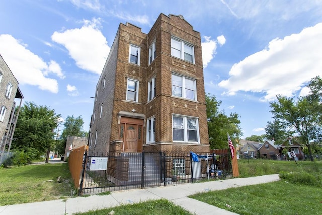 view of property featuring a fenced front yard