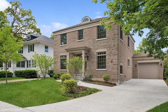 view of front of home featuring a front yard, concrete driveway, and brick siding