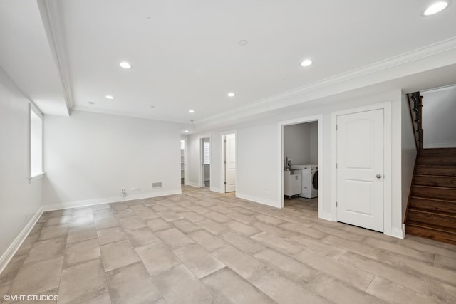 interior space featuring recessed lighting, visible vents, baseboards, washer and clothes dryer, and crown molding