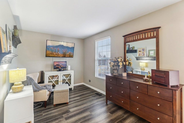 sitting room featuring dark wood-style floors and baseboards