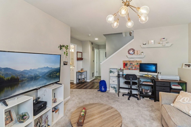 office area with a chandelier, carpet flooring, and baseboards